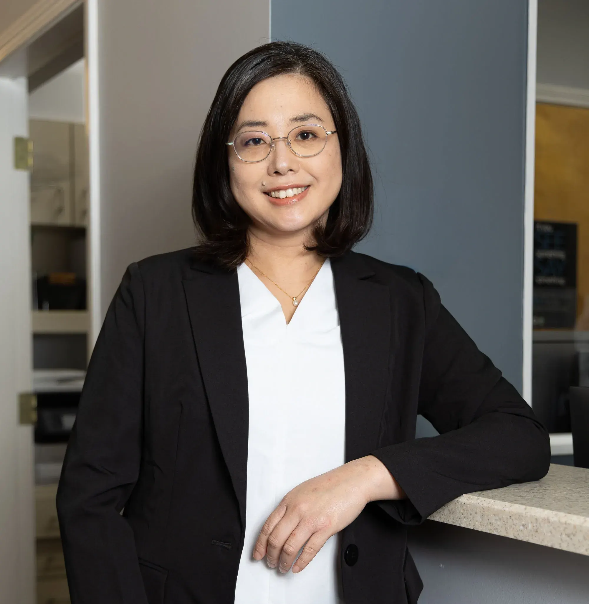 Dr. Yumi Ogata, board-certified periodontist at Smile Brookline in Brookline, Massachusetts